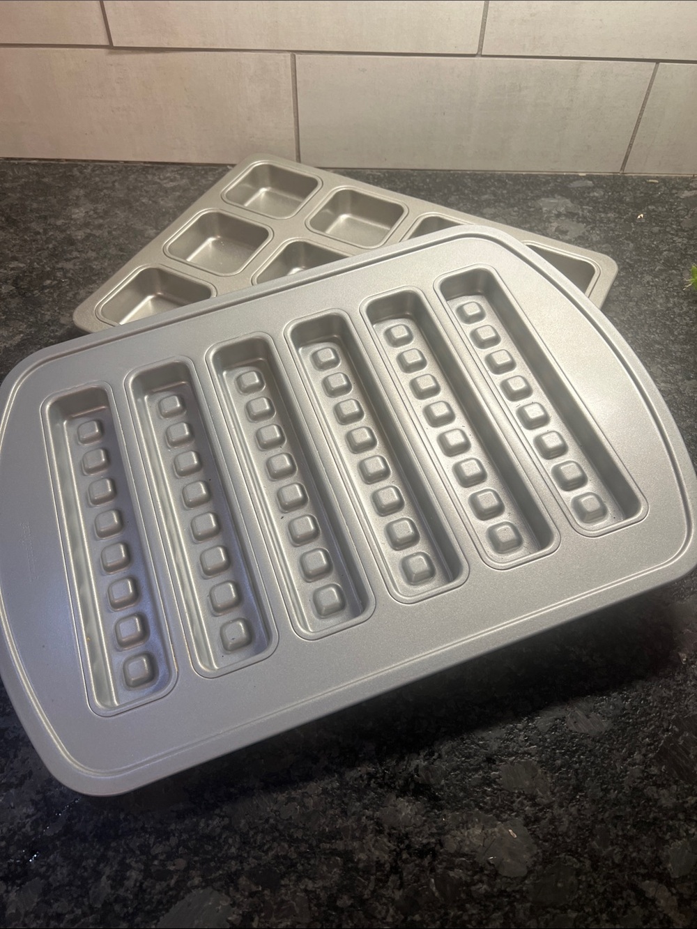 Pampered Chef Waffle Baking Pan. And a brownie pan too. Non stick. Great shape